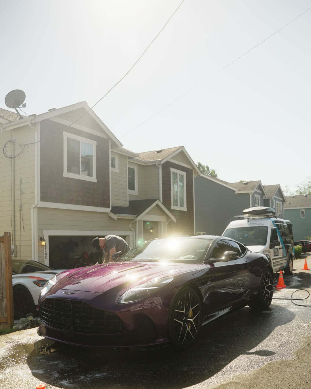 A purple Aston Martin after a mobile detail by Aesthetic Auto Salon